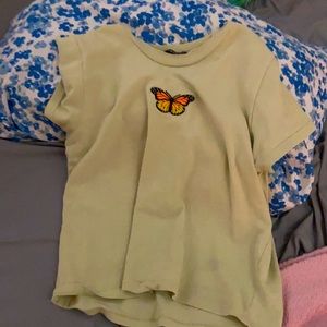 Green tee shirt with butterfly